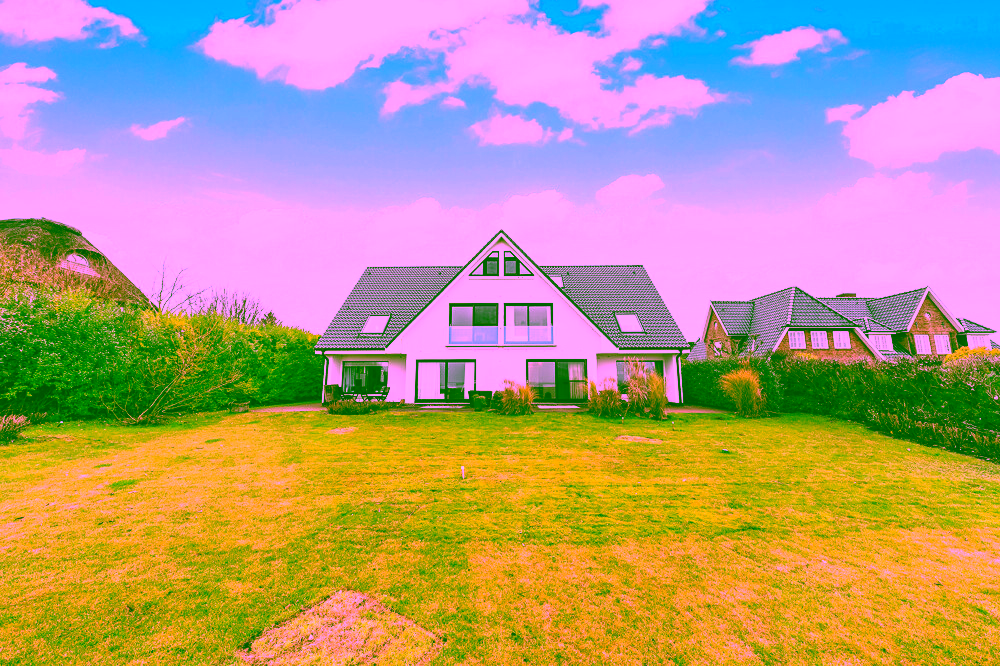 Meer sehen, Ruhe genießen – Erdgeschosswohnung mit Terrasse & einzigartigem Ausblick - Außenansicht