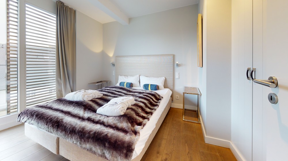 Einzigartiges Penthouse mit Leuchtturmblick und planbarer Rendite - Schlafzimmer