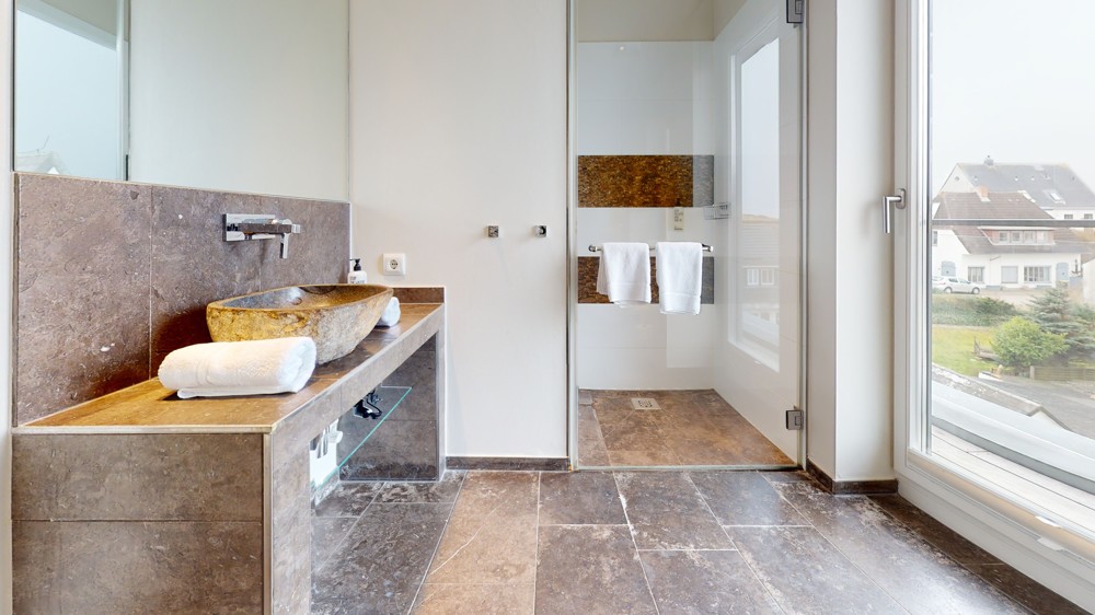 Einzigartiges Penthouse mit Leuchtturmblick und planbarer Rendite - Badezimmer