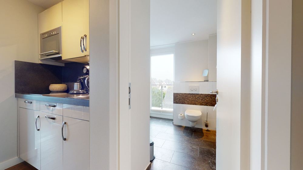 Einzigartiges Penthouse mit Leuchtturmblick und planbarer Rendite - Küchenzeile