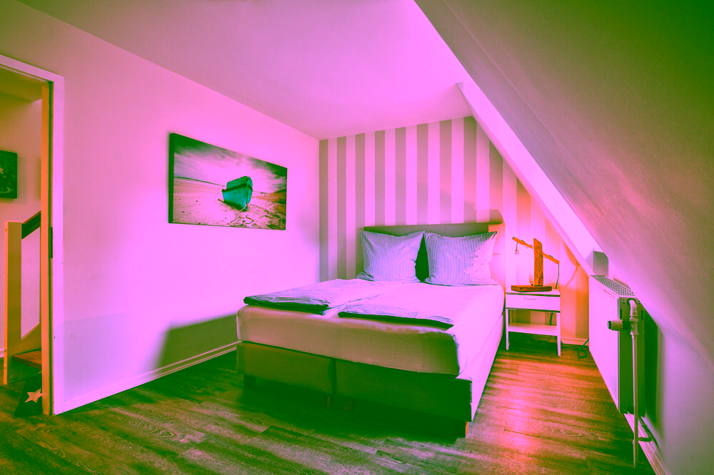 "Plyck-Hüs" – Charmantes Küstendomizil im Süden Sylts - Schlafzimmer Nr.1