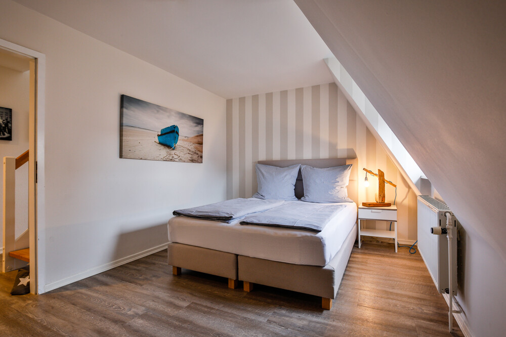 "Plyck-Hüs" – Charmantes Küstendomizil im Süden Sylts - Schlafzimmer Nr.1