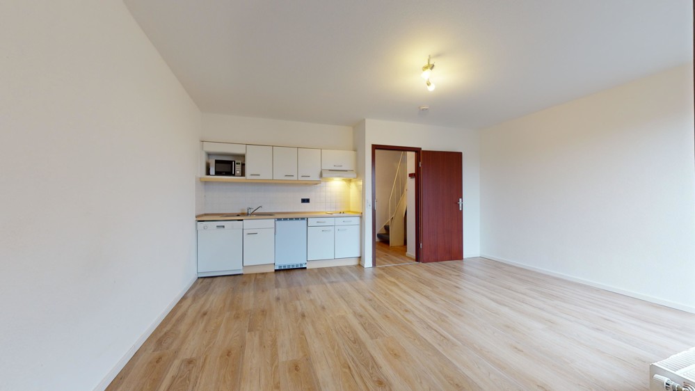 Helle 2-Zimmer-Wohnung mit Balkon und Westausrichtung – Ihr neues Zuhause wartet! - Wohnzimmer