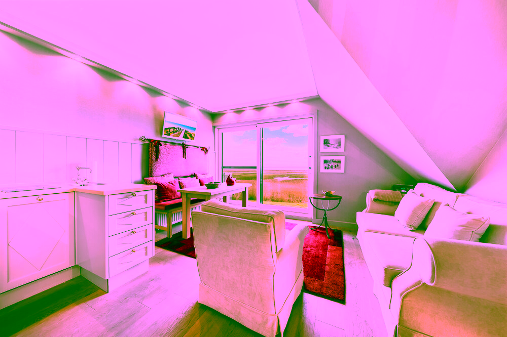 Traumhafte Wohnung: Wiesen, Wattenmeer und Weitblick direkt vor der Tür! - Blick in den Wohn- Essbereich