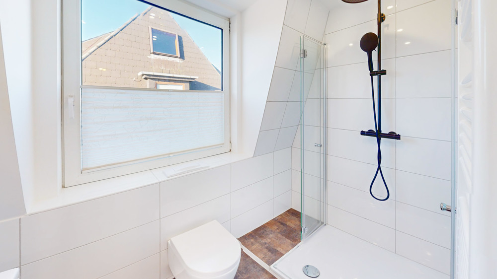 Renovierte Doppelhaushälfte mit Garten – zentral gelegen auf Sylt - Bild