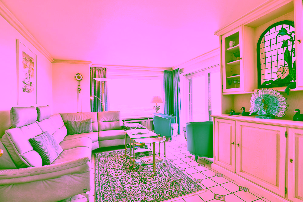 Traumhaus unter Reet mit sensationellem Meerblick - Wohnzimmer