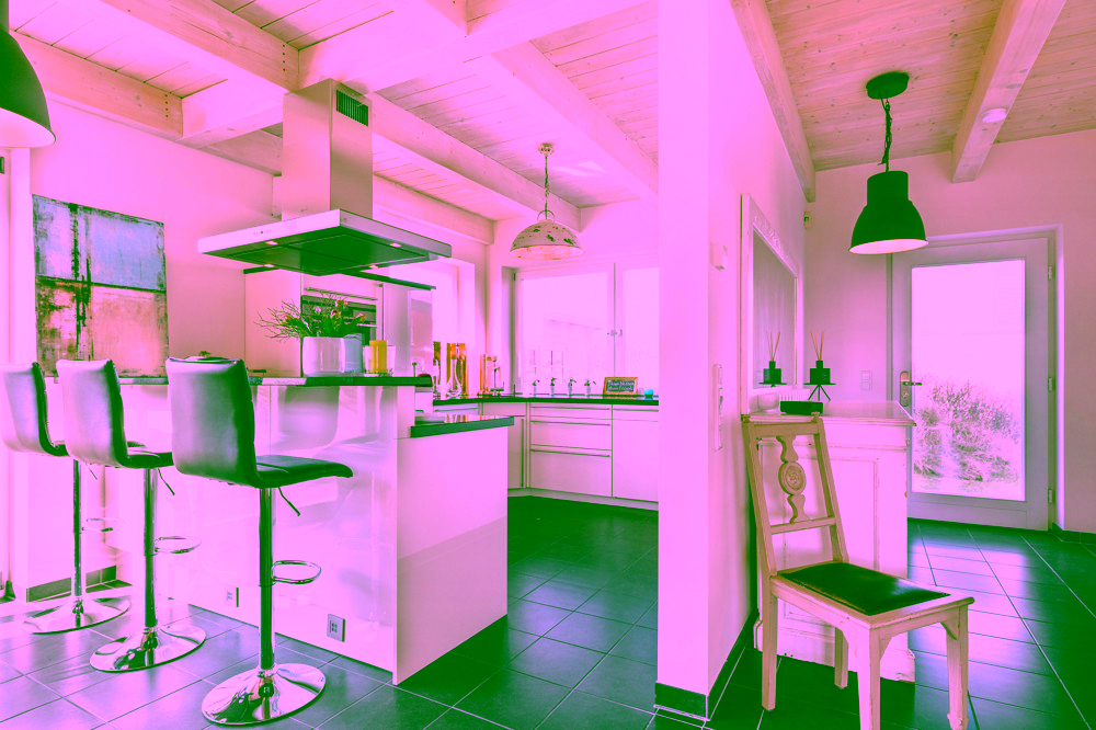 Nordisches Wohngefühl in Meeresnähe - Modern ausgestattete Küche mit integriertem Tresen