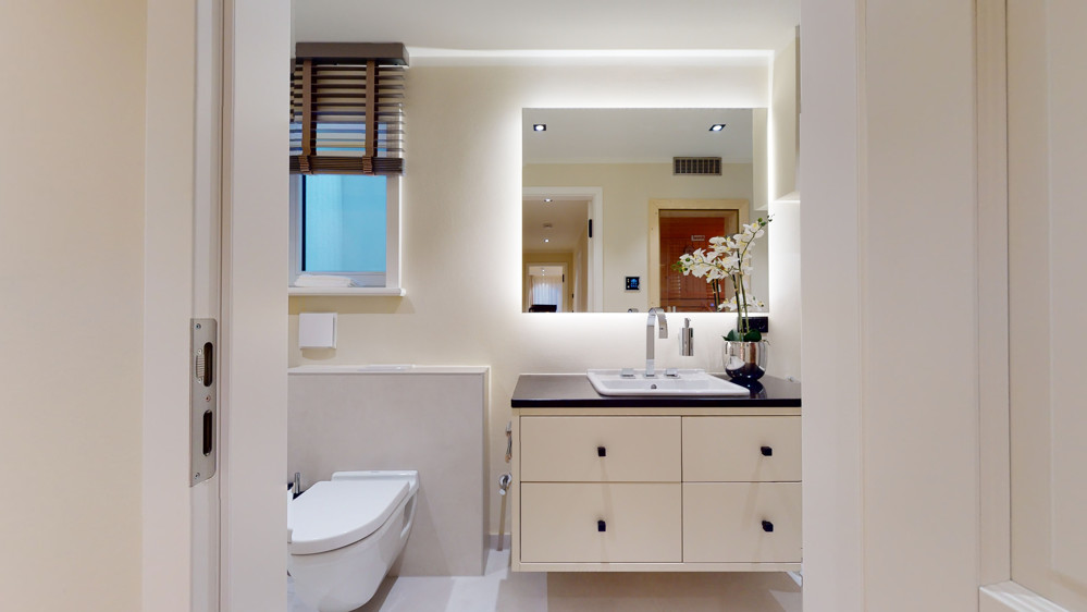 Außergewöhnliche und große Erdgeschosswohnung mit Garten im Herzen von Hörnum - Badezimmer