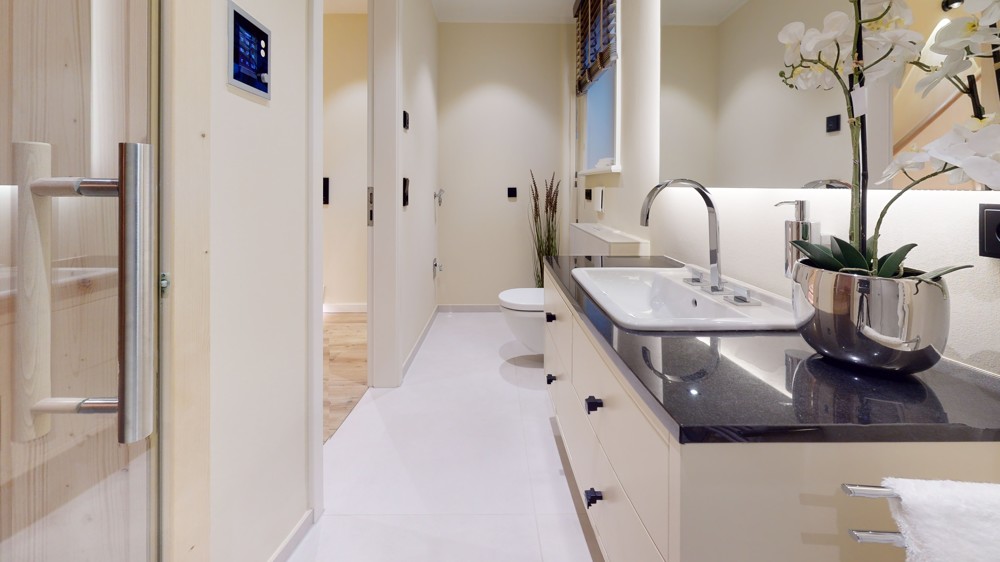 Außergewöhnliche und große Erdgeschosswohnung mit Garten im Herzen von Hörnum - Badezimmer