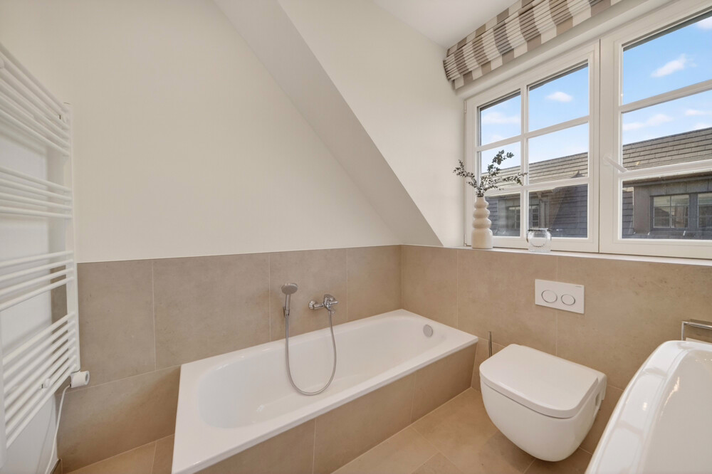 Badezimmer mit Badewannw