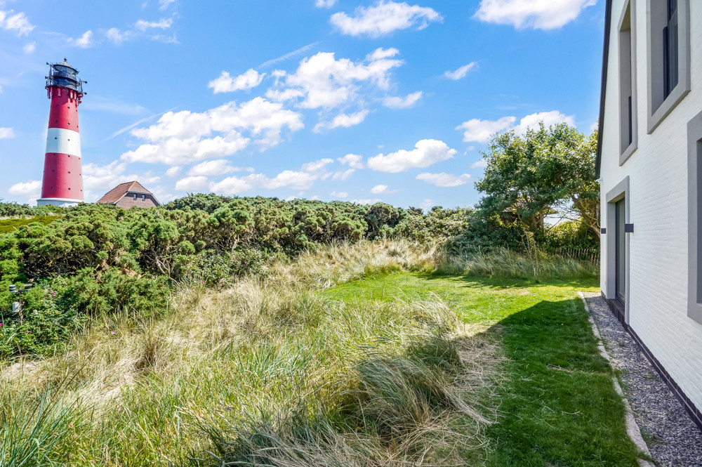 Wahrzeichen im Blick – Stilvolles Wohnen mit Nordseepanorama - Garten