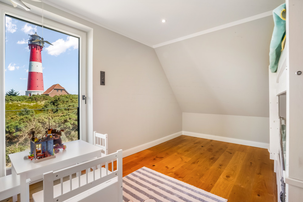 Wahrzeichen im Blick – Stilvolles Wohnen mit Nordseepanorama - Kinderzimmer