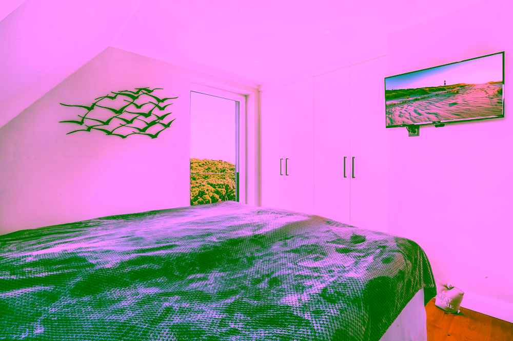 Wahrzeichen im Blick – Stilvolles Wohnen mit Nordseepanorama - Schlafzimmer