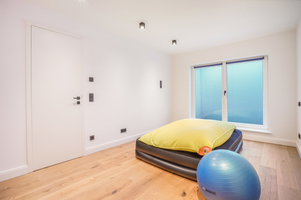 Wahrzeichen im Blick – Stilvolles Wohnen mit Nordseepanorama - Zimmer Souterrain