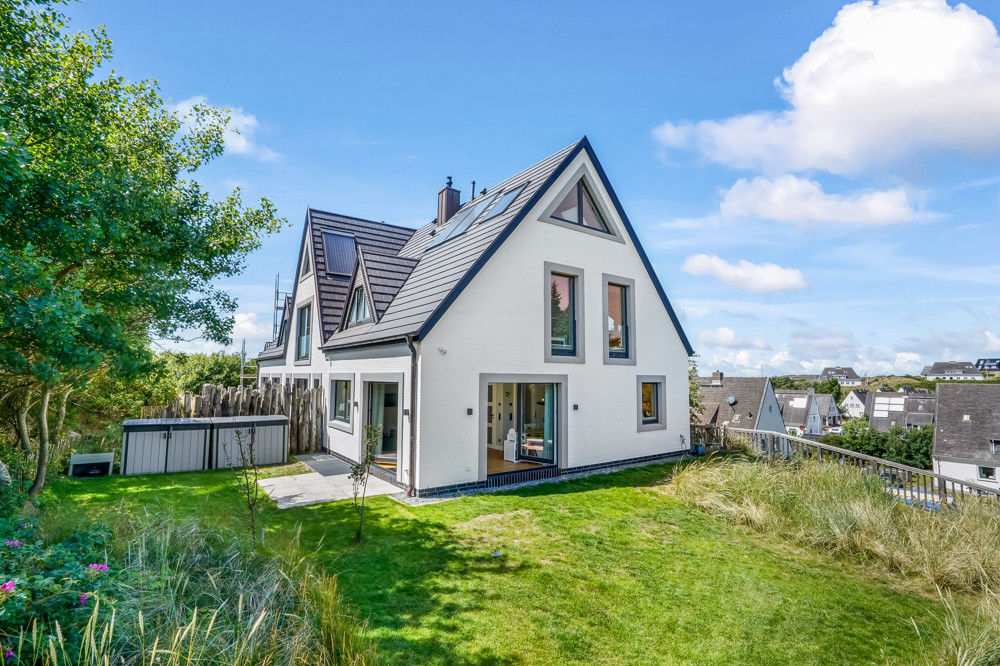 Wahrzeichen im Blick – Stilvolles Wohnen mit Nordseepanorama - Außenansicht