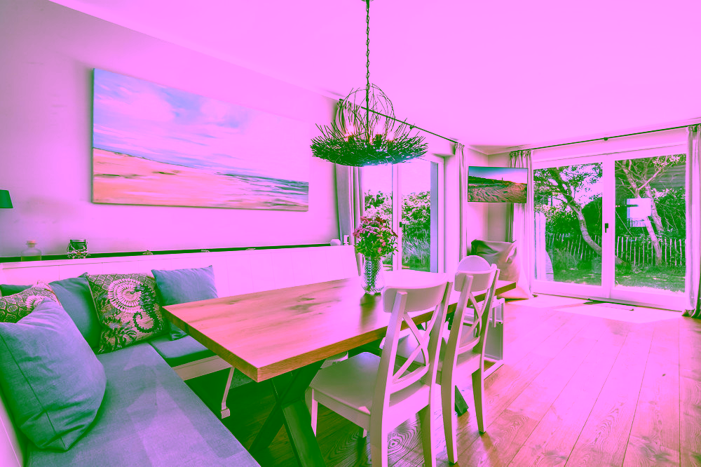 Wahrzeichen im Blick – Stilvolles Wohnen mit Nordseepanorama - Wohnzimmer