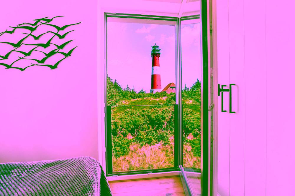 Wahrzeichen im Blick – Stilvolles Wohnen mit Nordseepanorama - Schlafzimmer