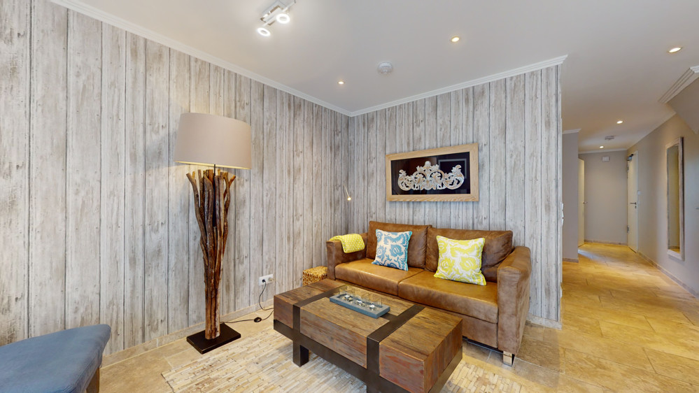 Hochwertige Kapitalanlage in exklusiver Lage im Aparthotel am Leuchtturm - Wohnzimmer