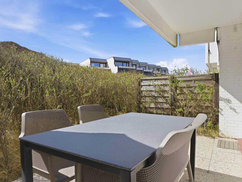 Wohntraum am Dünenrand: Exklusive Erdgeschosswohnung im Strandweg, Hörnum - Südwest-Terrasse