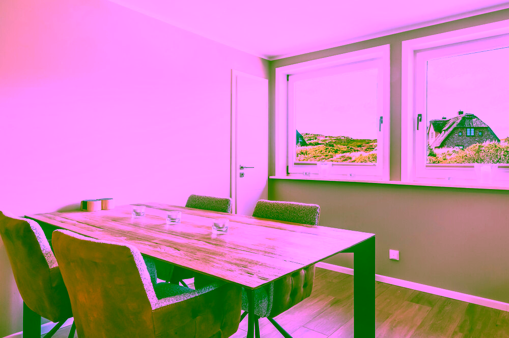 Reetgedeckte Drei-Zimmer-Wohnung mit Blick aufs Wattenmeer in Rantum - Wohne-/Essbereich