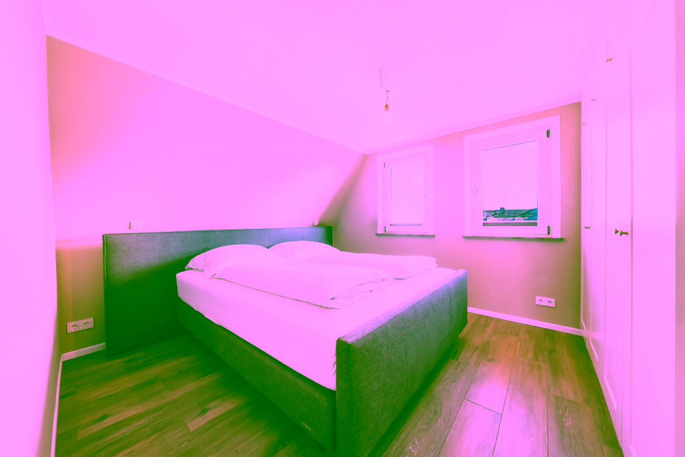 Reetgedeckte Drei-Zimmer-Wohnung mit Blick aufs Wattenmeer in Rantum - Schlafzimmer