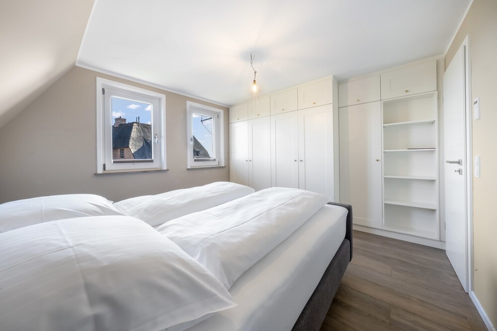 Reetgedeckte Drei-Zimmer-Wohnung mit Blick aufs Wattenmeer in Rantum - Schlafzimmer