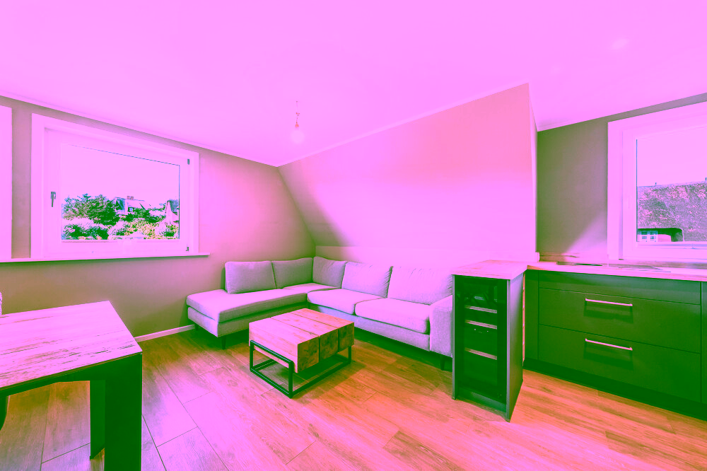 Reetgedeckte Drei-Zimmer-Wohnung mit Blick aufs Wattenmeer in Rantum - Wohnbereich