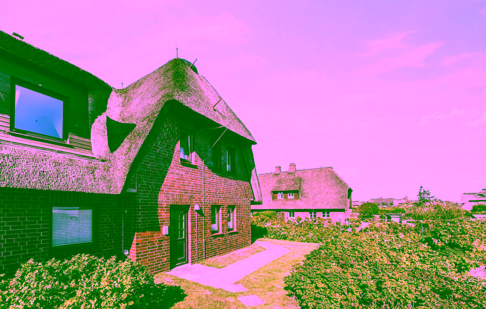 Reetgedeckte Drei-Zimmer-Wohnung mit Blick aufs Wattenmeer in Rantum - Außenansicht