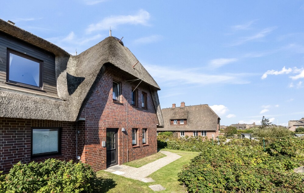 Reetgedeckte Drei-Zimmer-Wohnung mit Blick aufs Wattenmeer in Rantum - Außenansicht