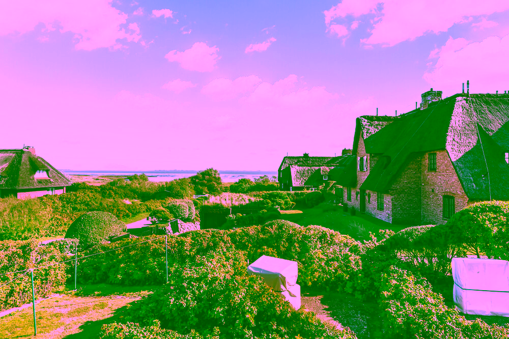 Reetgedeckte Drei-Zimmer-Wohnung mit Blick aufs Wattenmeer in Rantum - Blick aus dem Schlafzimmer