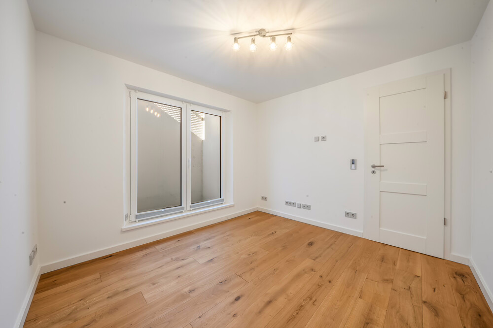 Klein wohnen, groß leben – Einzelhaus mit großzügigem Garten für Gewerbetreibende & Freiberufler - Zimmer Souterrain