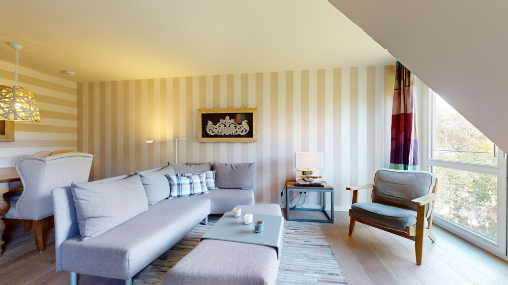 Hochwertige Kapitalanlage in exklusiver Lage im Aparthotel am Leuchtturm - Wohnzimmer