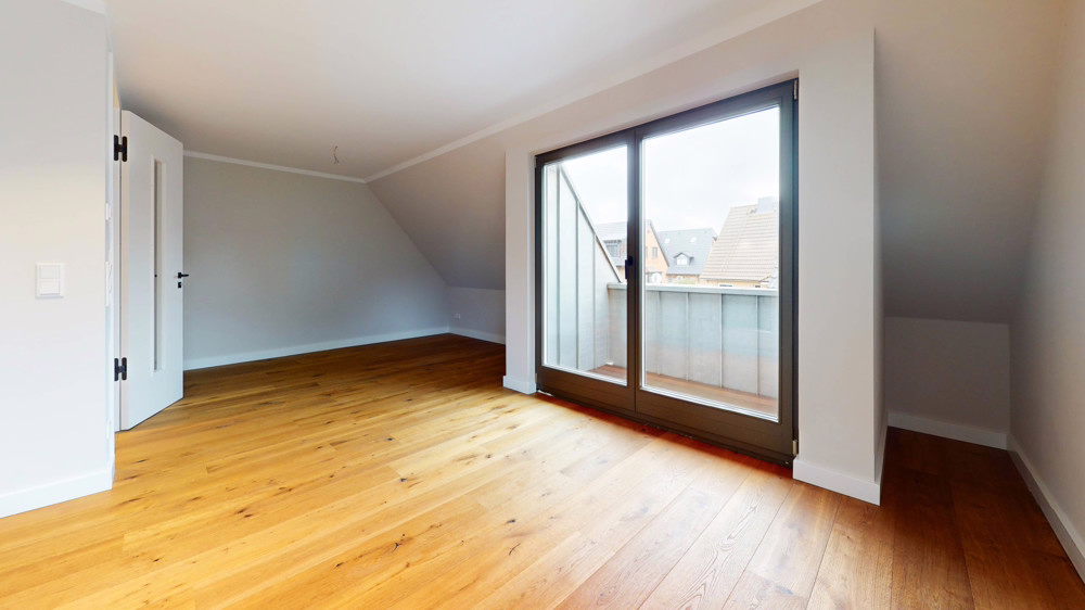 Hochwertige Neubauwohnung in strandnaher Lage mit Südbalkon - Wohnzimmer