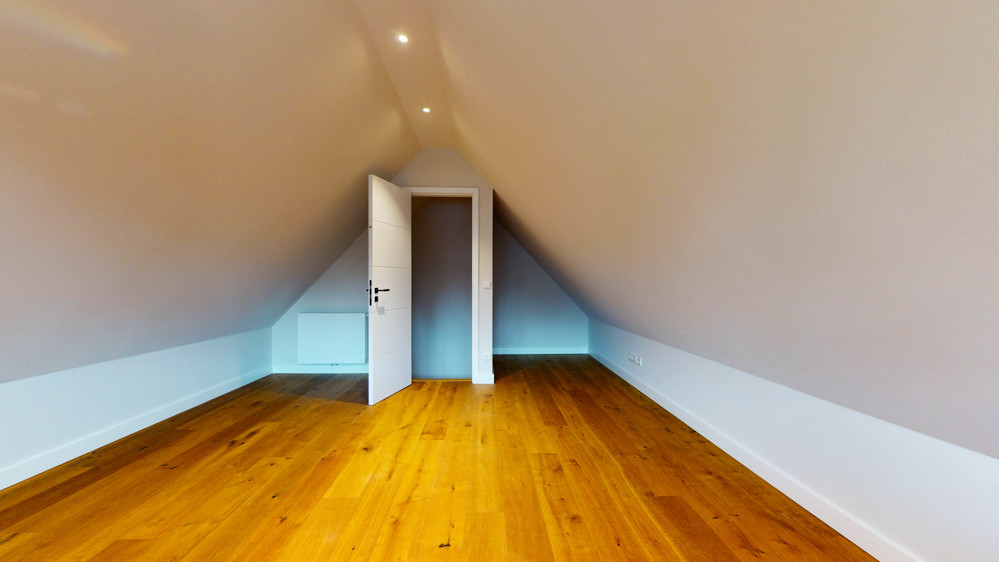 Hochwertige Neubauwohnung in strandnaher Lage mit Südbalkon - Spitzboden