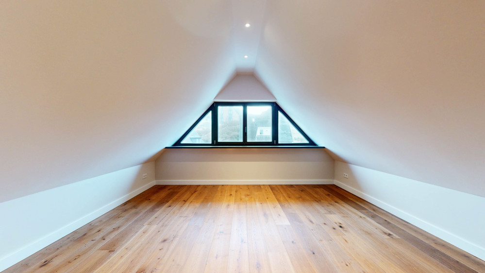 Hochwertige Neubauwohnung in strandnaher Lage mit Südbalkon - Spitzboden