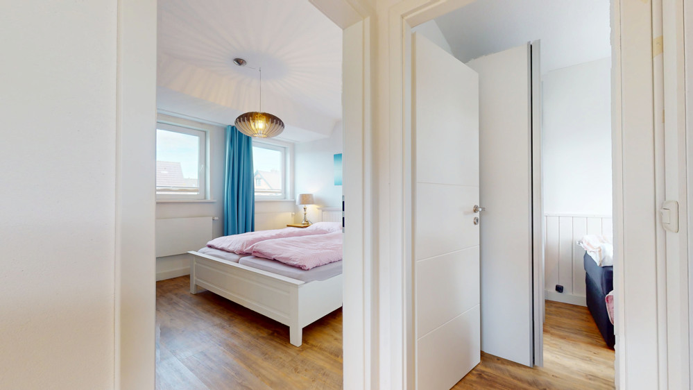 Hörnumer Rarität - Rotklinker Doppelhaushälfte mit Blick auf die Dünen - Blick in die Schlafzimmer